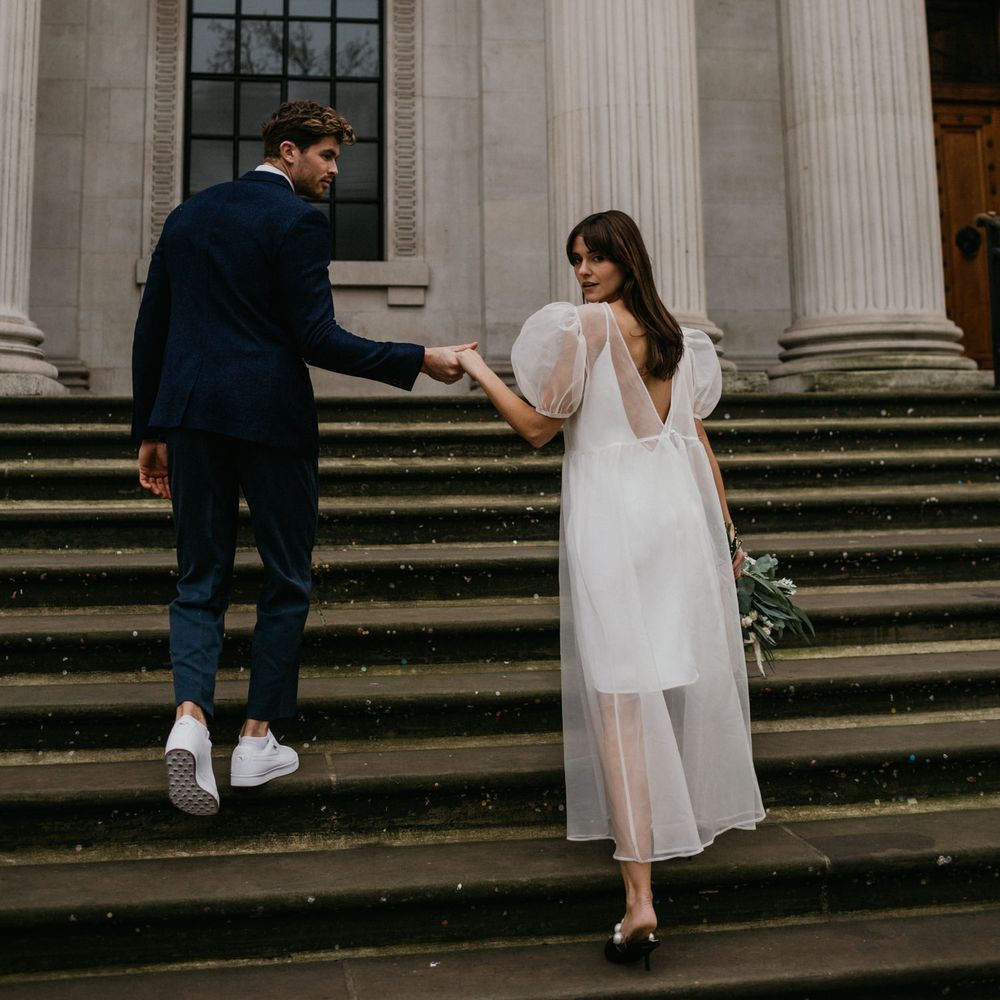 Bride in Story Of My Dress gown for micro wedding 