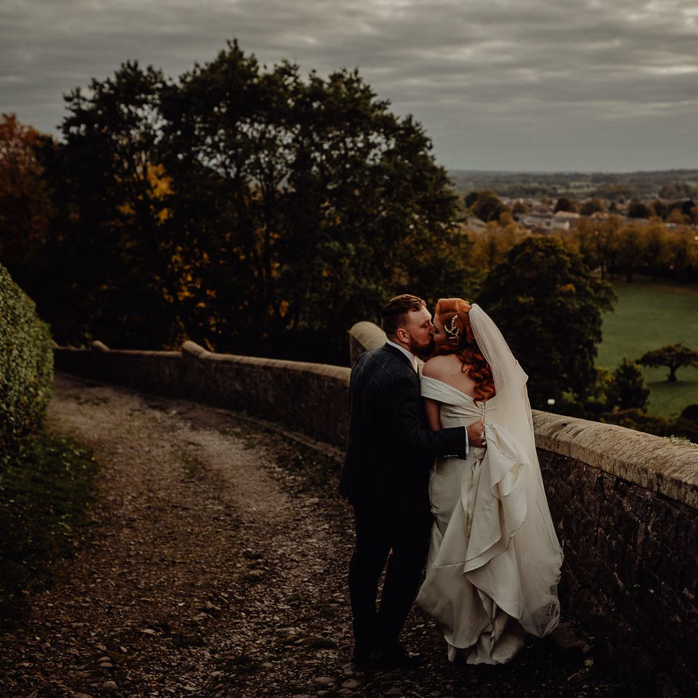Bride and groom portrait at Clitheroe Castle by Louise Griffin Photography