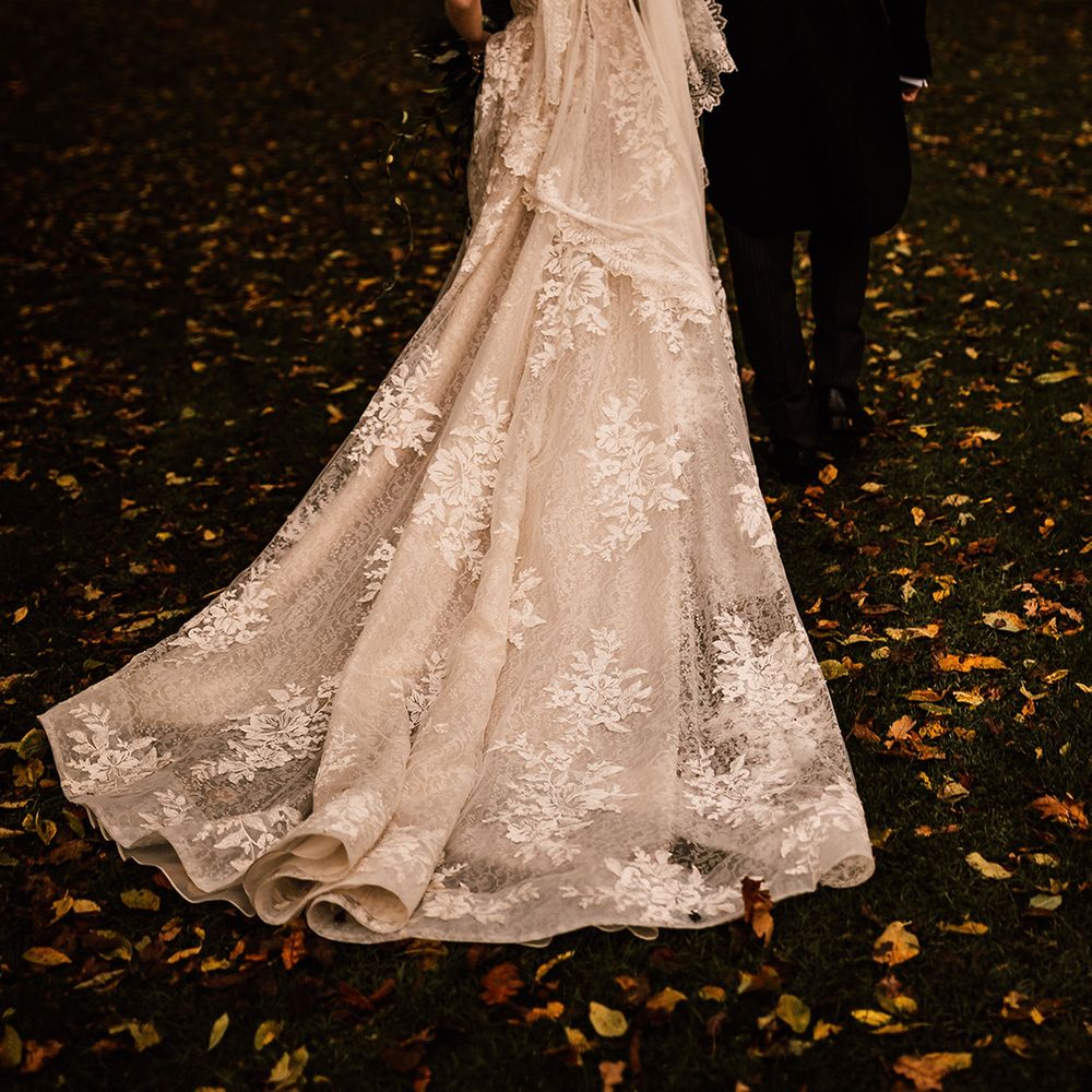 Lace detail wedding dress with off the shoulder sleeves