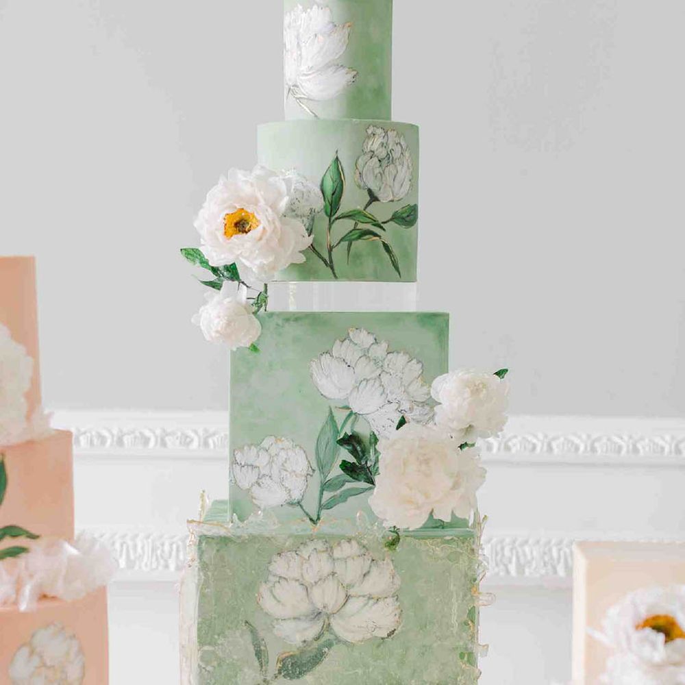 Pastel green four tier square wedding cake 