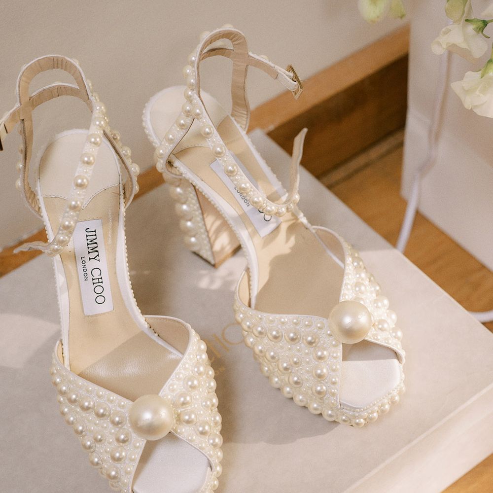 Jimmy Choo pearl platform wedding shoes with peep toe and ankle strap for the bride 