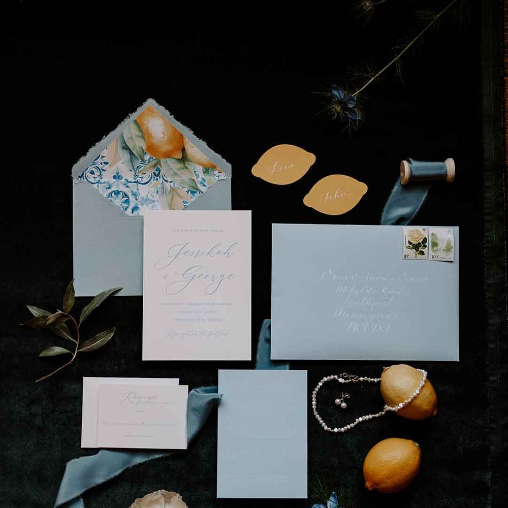 blue, white and lemon wedding stationery suite 