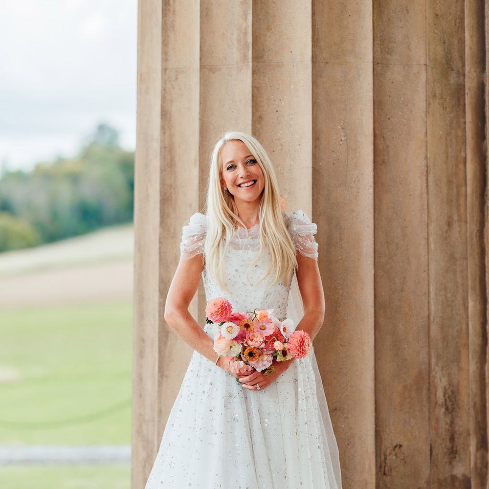 Bride in sparkly princess wedding dress from Jenny Packham with pink wedding bouquet
