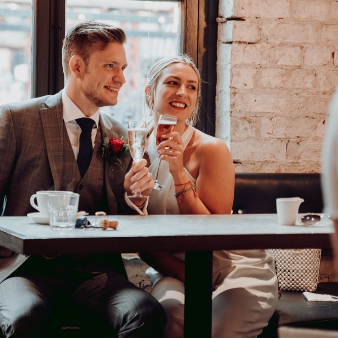 Champagne toast after intimate micro wedding 