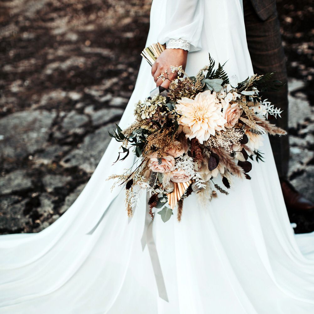A mix of dried and fresh flowers for blush pink bridal bouquet 