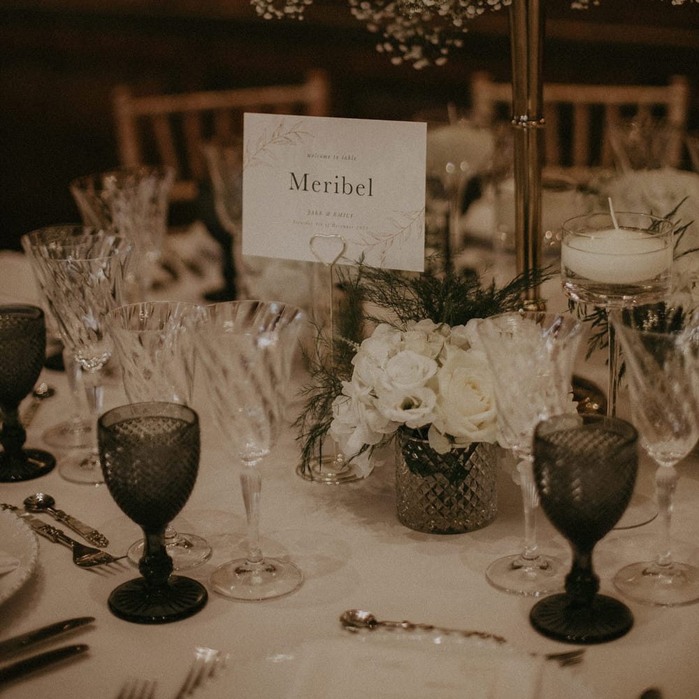 Classic wedding dinner table set with stationery 