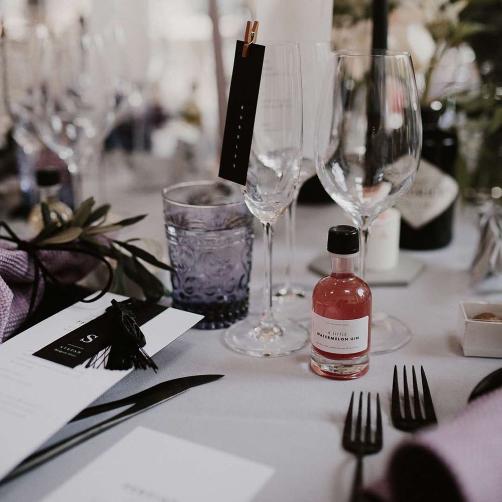 Minimal toned wedding tablescape with DIY made stationery and details