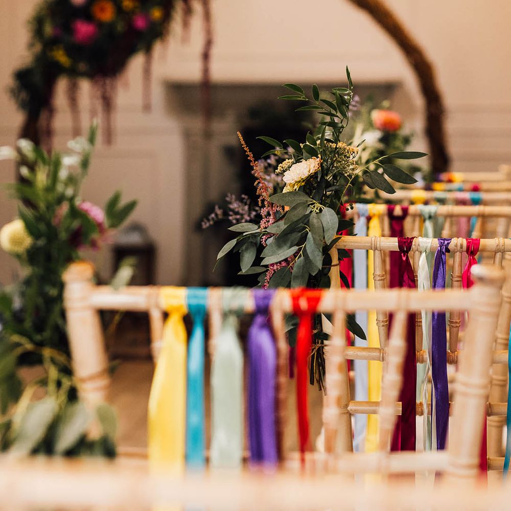 Colourful ribbon chair back decor for LGBTQIA+ wedding 
