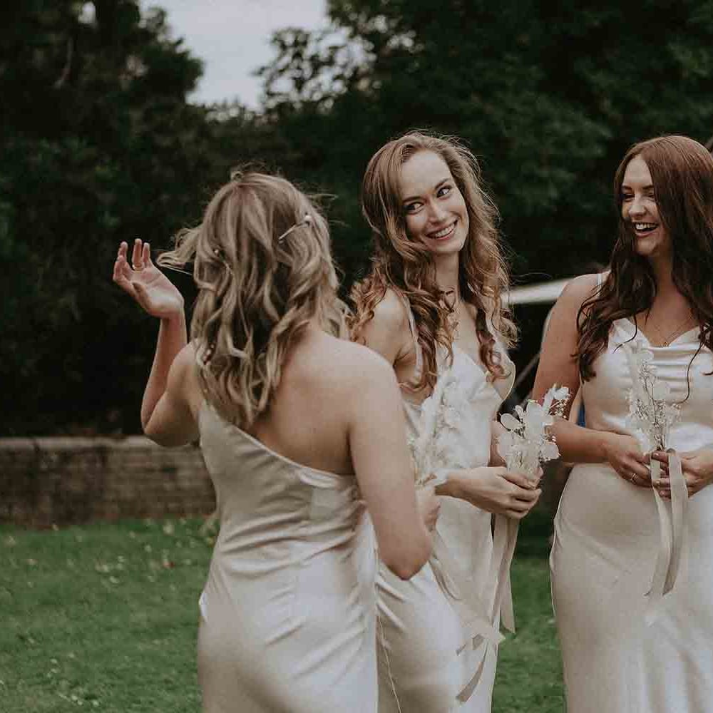 Champagne bridesmaid dresses with neutral bouquets