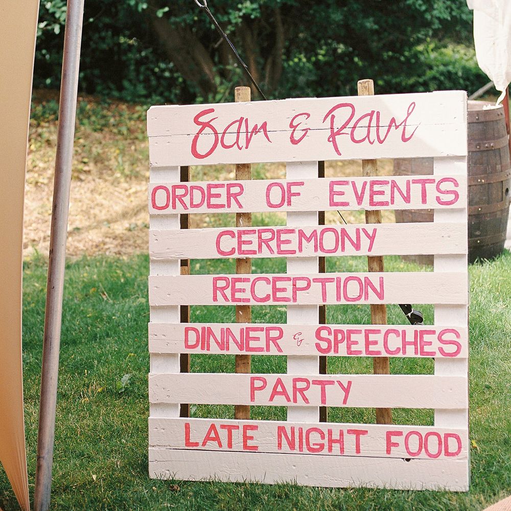 Wooden order of the day wedding sign