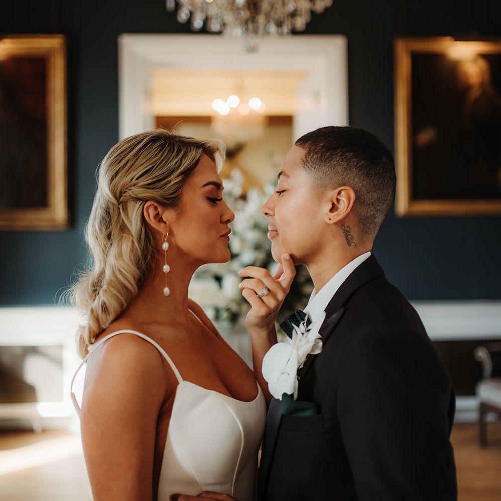 Luxury LGBTQI+ wedding at Hodsock Priory with princes wedding dress and tuxedo 