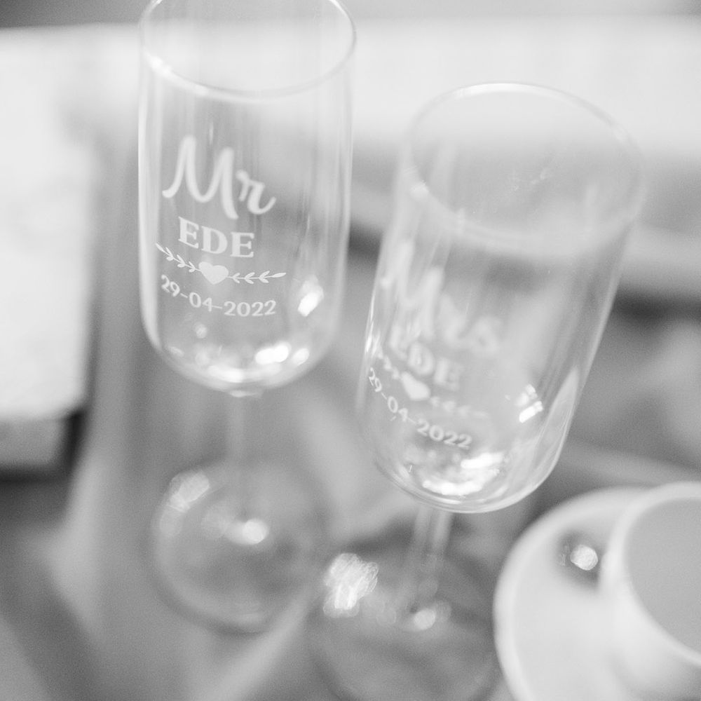 Personalised champagne flutes for the bride and groom 