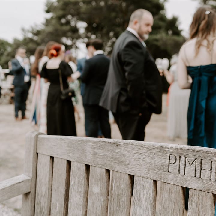Engraved wooden bench at Pimhill Barn wedding venue 