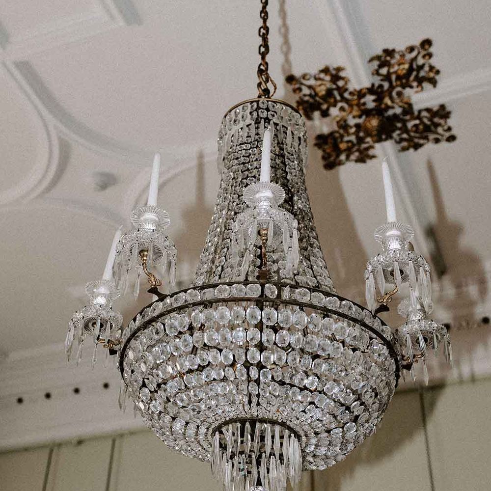 Luxury chandelier wedding venue decor at Capesthorne Hall