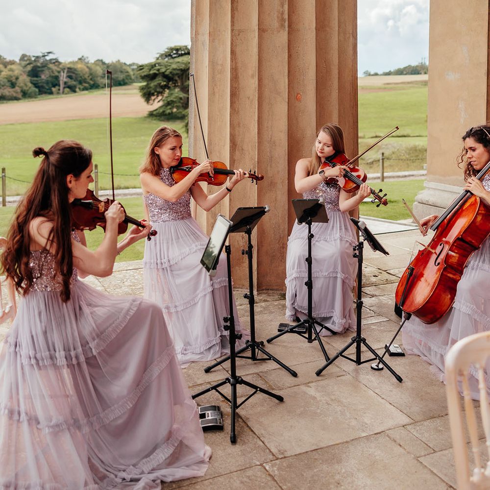 String quartet playing at wedding ceremony 