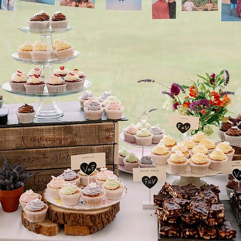 Image of a dessert table at wedding reception, image by Captured By Katrina Photography