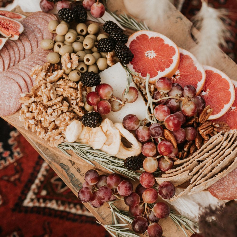 Grazing plate with grapes, walnuts and oranges