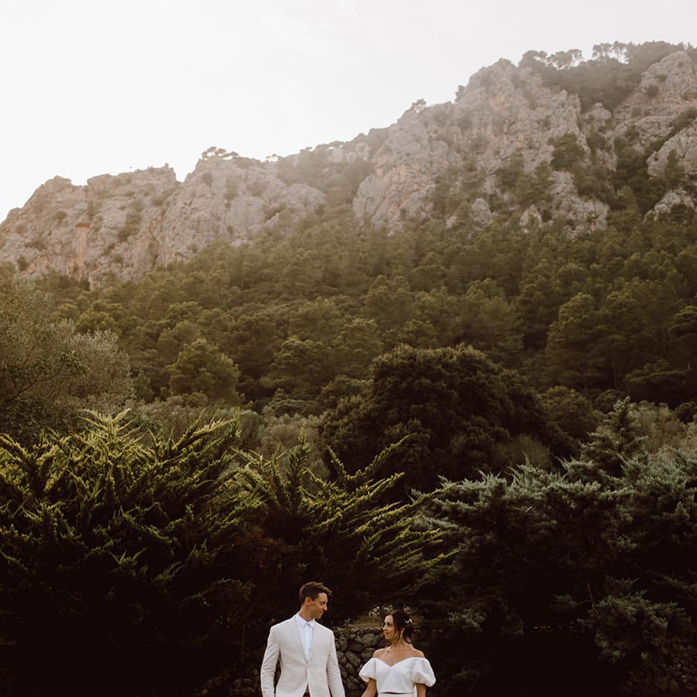 Bride and groom holding hands
