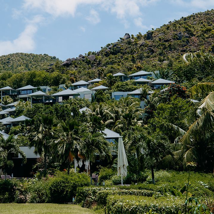 Baby blue private pool villas in the mountains of Raffles Hotel and Resort in Praslin Island, Seychelles for Seychelles elopement