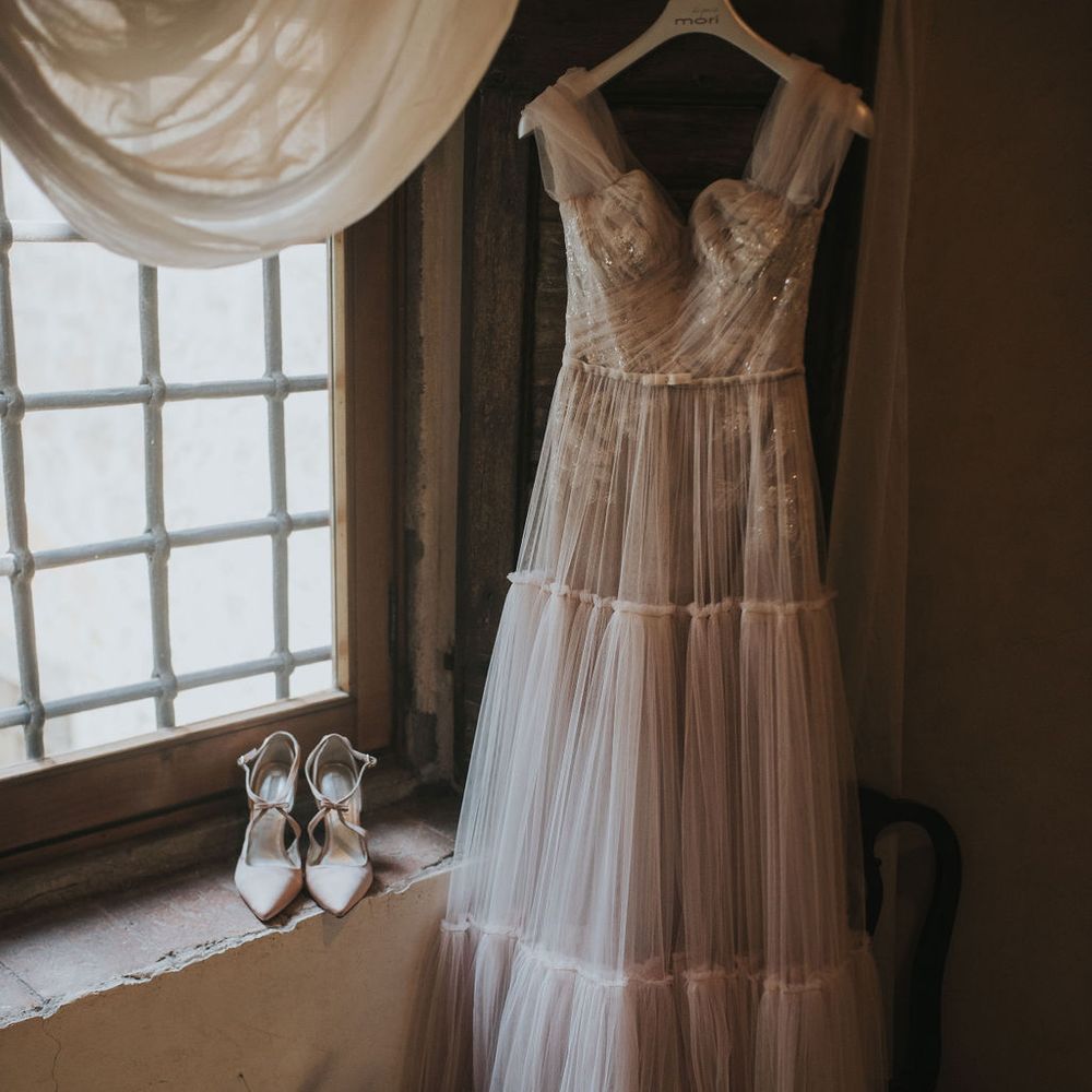 Blush pink Berta wedding dress, shoes and bridal bouquet 