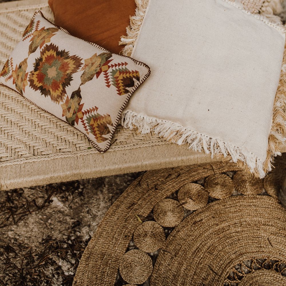 Boho style pillows on outdoor bed