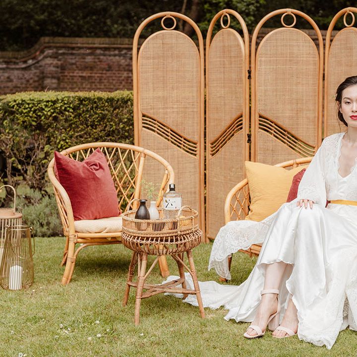 Japanese wedding inspiration at Gorse Hill, Surrey with bamboo screen and furniture and East Asian bride in a lace kimono style wedding dress 
