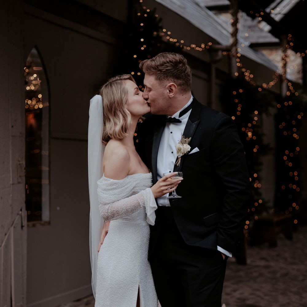 Lancashire wedding with a classic old Hollywood styling with the groom in a black tux and the bride in an off the shoulder sparkly wedding dress