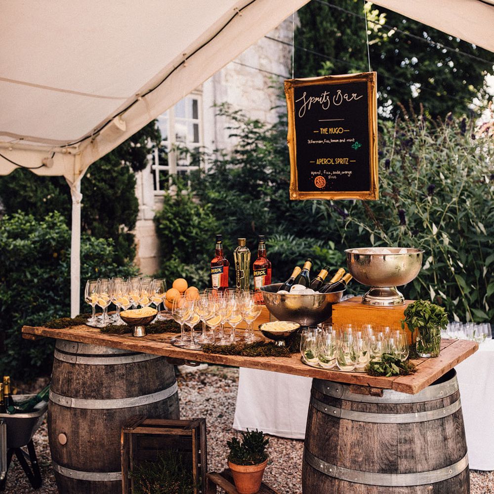 Themed wedding bar design idea with 'spritz bar' serving Aperol Spritz and more cocktails 