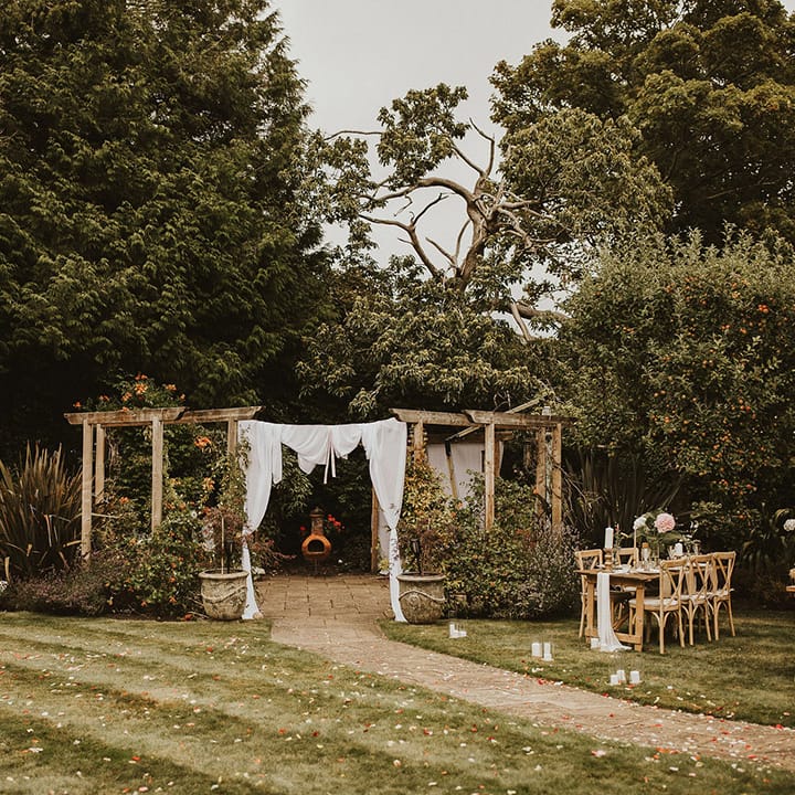 Outdoor wedding in garden complete with DIY touches and Iranian traditions 