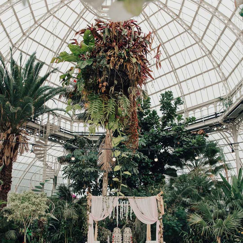 Hindu wedding at Sefton Park with botanical theme, white runner and mandap 