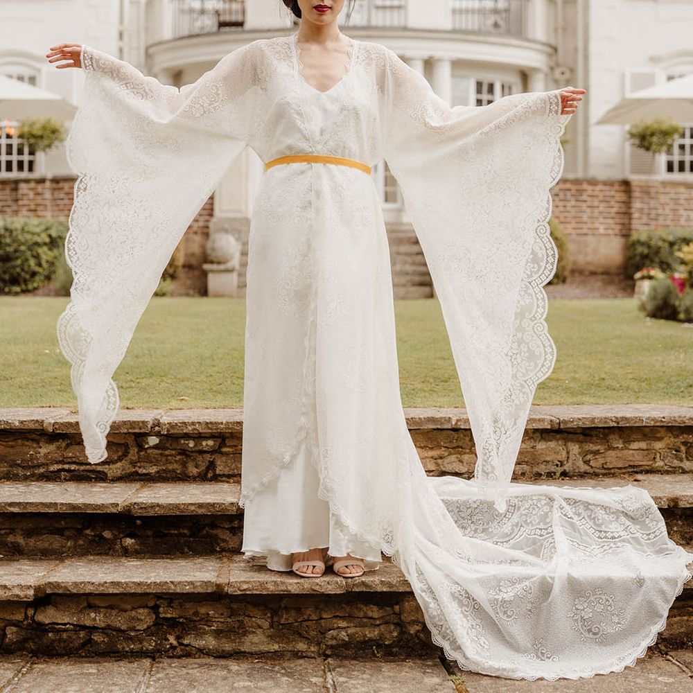 Bride in a lace kimono style wedding dress with long sleeves at Gorse Hill Japanese wedding inspiration shoot 