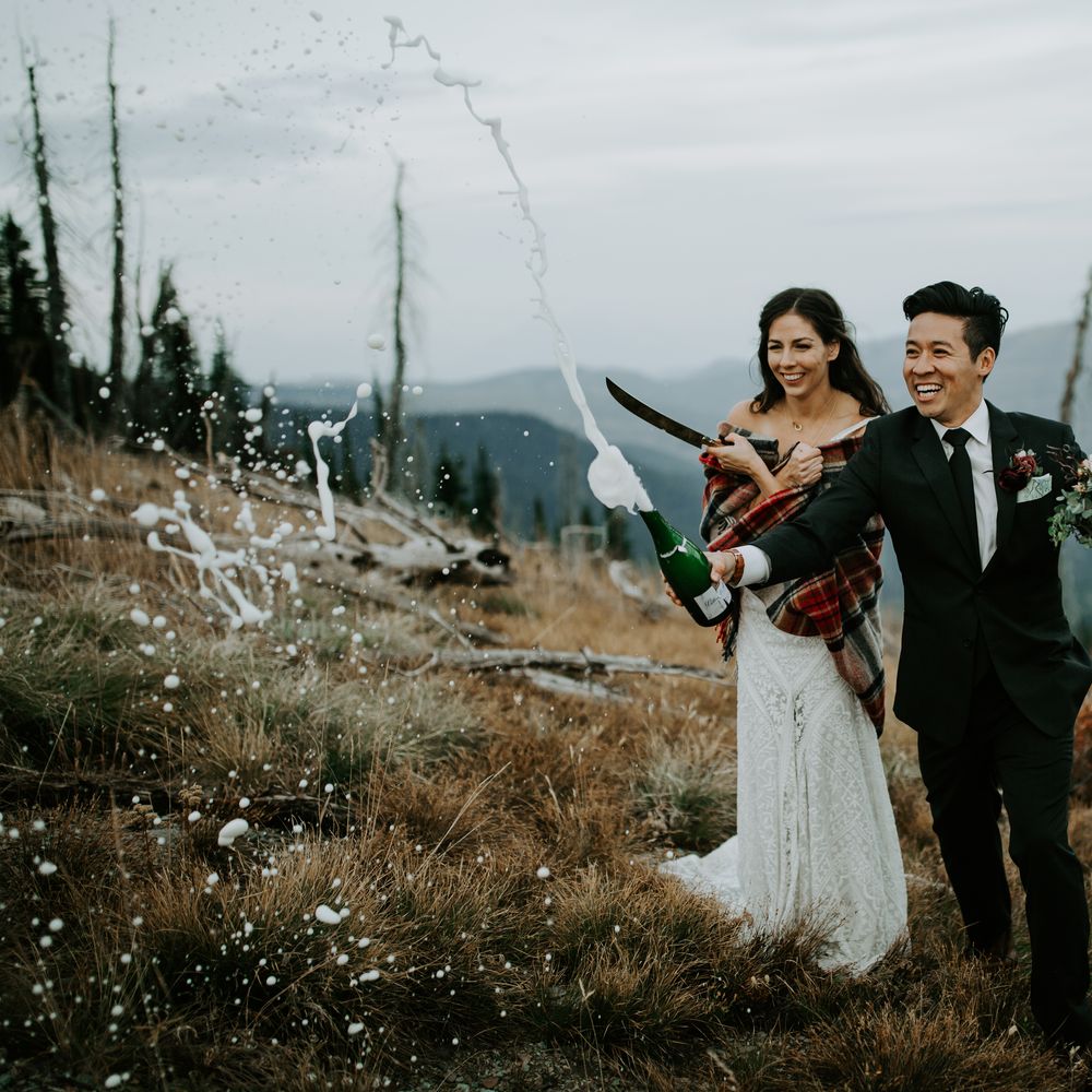 Bride & groom celebrate marriage with champagne 
