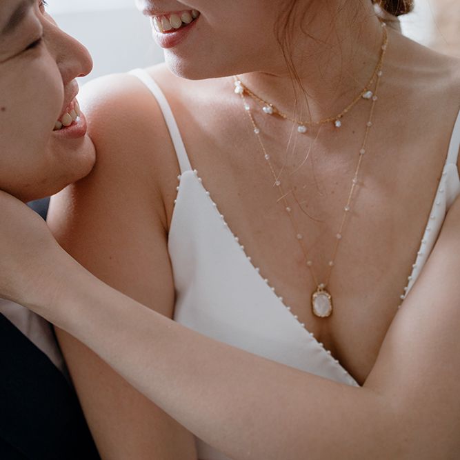 Bride in layered bridal necklaces 