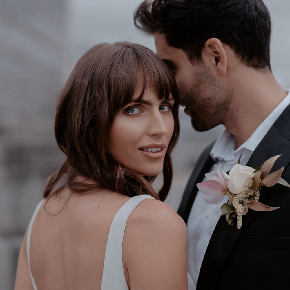 Beautiful bride with a fringe with natural wedding day makeup 