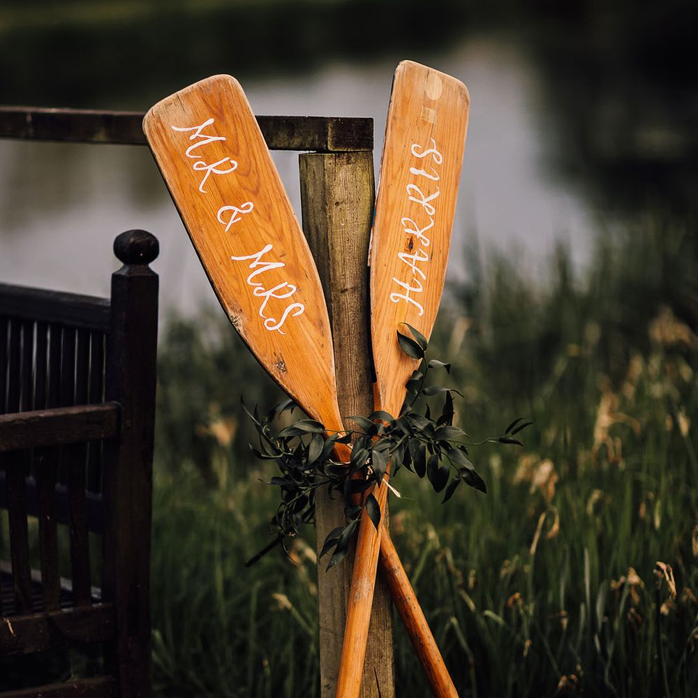 Personalised oars for wedding decor at Houghton Lodge 