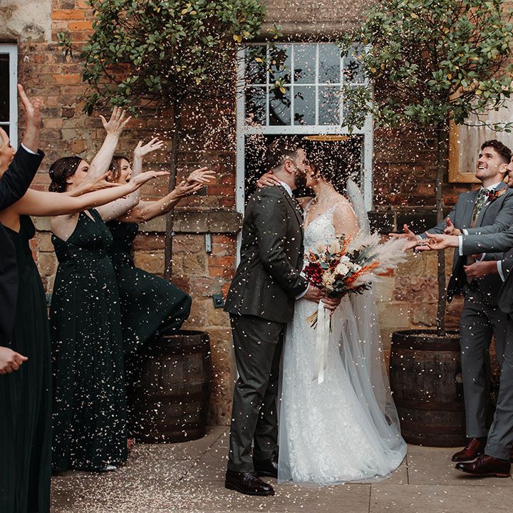 Confetti moment for the bride and groom at their industrial wedding in Derbyshire 