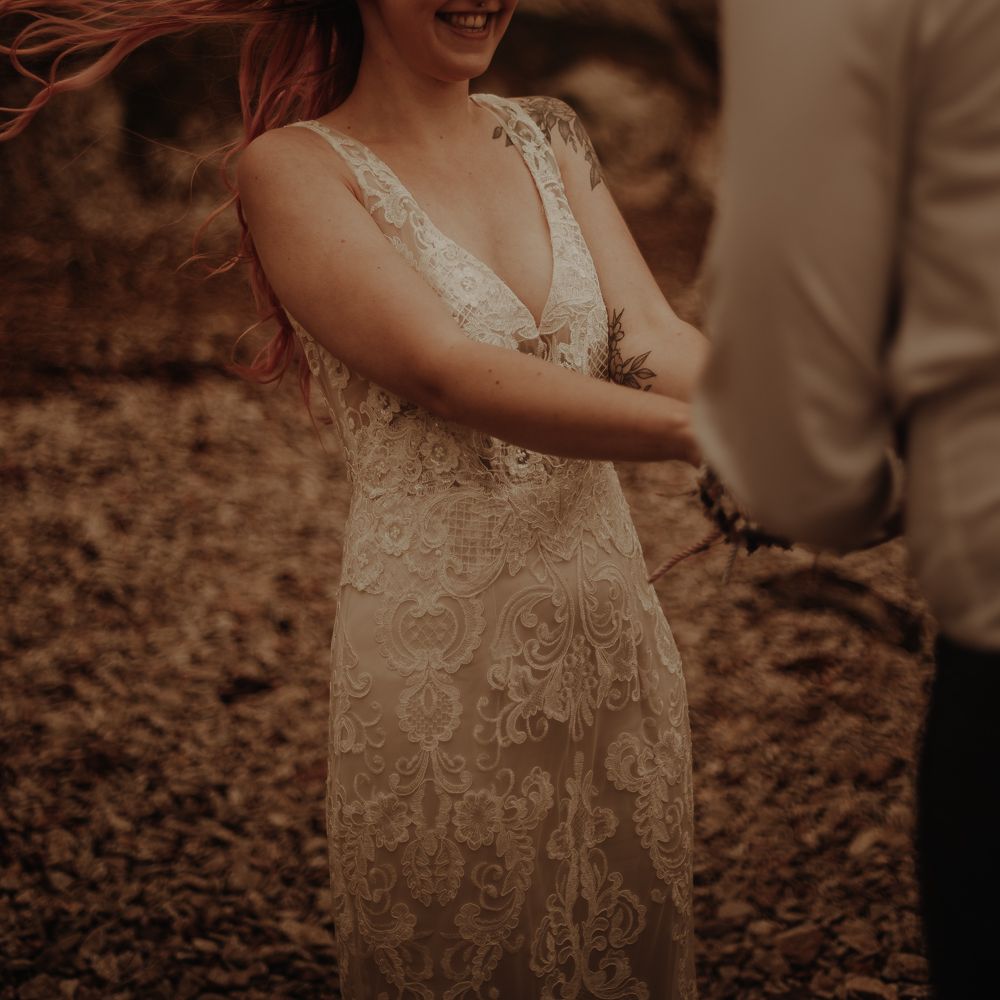 Bride in lace wedding dress at intimate elopement