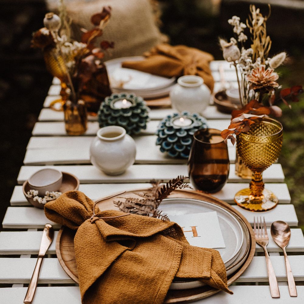 Burnt orange napkin tied with string