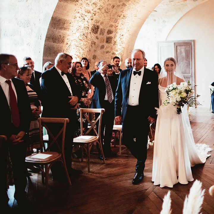 Bride walks down the aisle on her wedding day