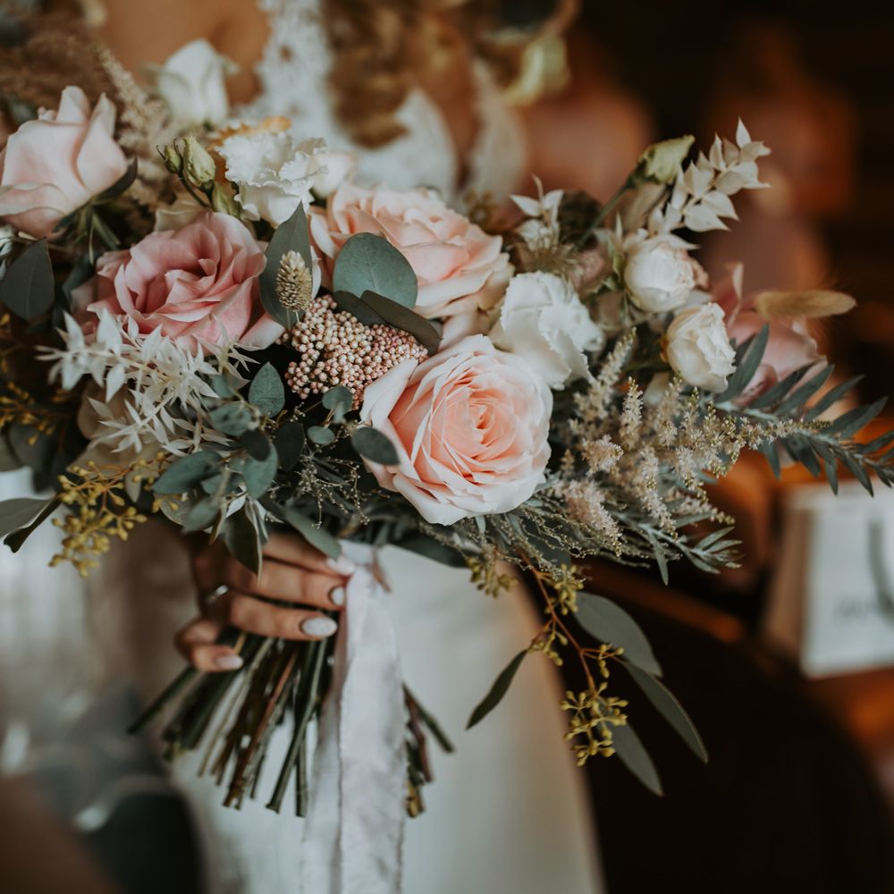 Light pink, white and green bridal bouquet for boho rustic wedding