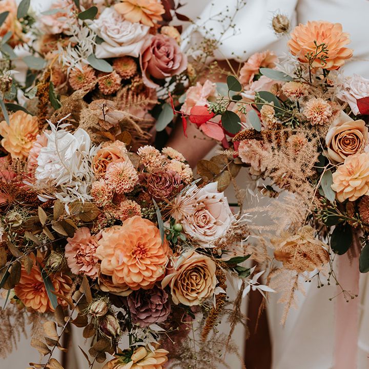 Toffee, rust and beige wedding flowers in autumnal warm tones for 70s inspired wedding
