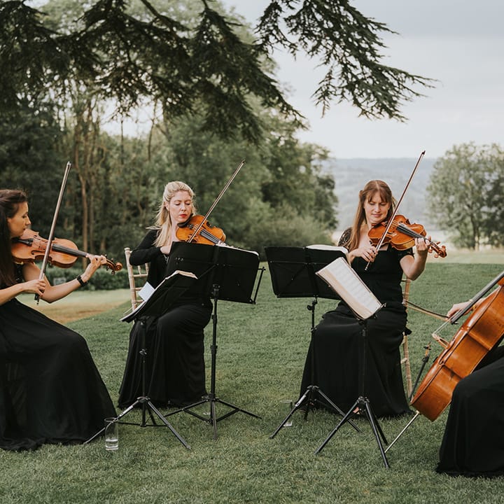 Live wedding band play outside for classic and traditional wedding 
