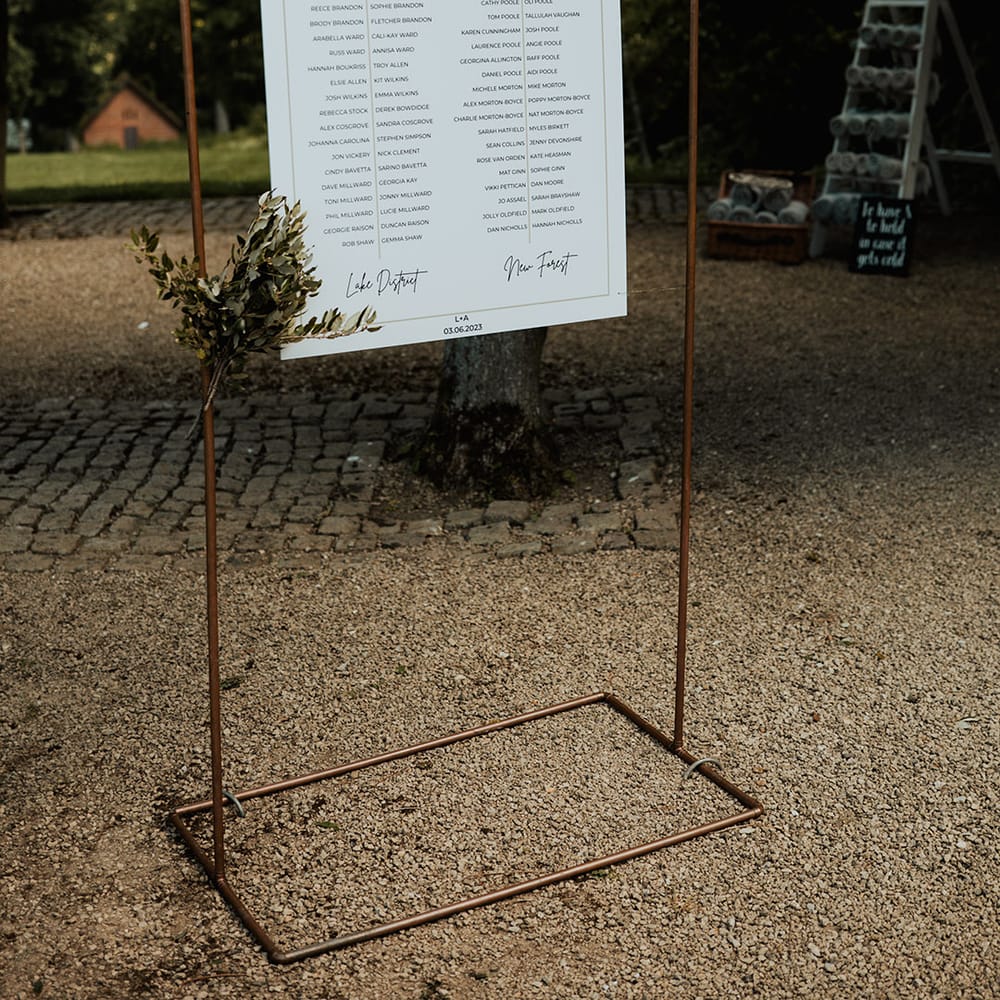 Minimalist black and white wedding sign table plan 
