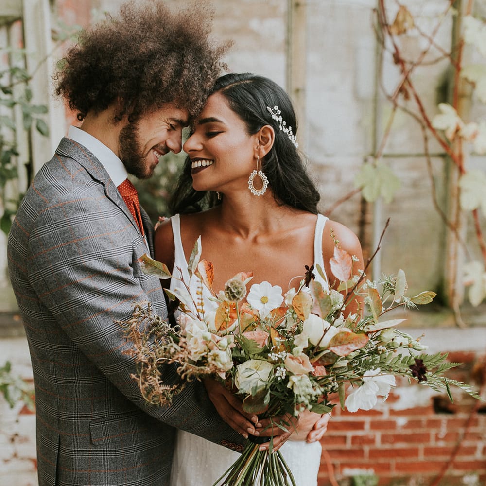 Bride and groom portrait by Lianne Gray Photography embracing 