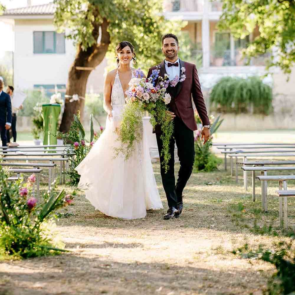 Outdoor wedding ceremony in Italy for Bride and Groom