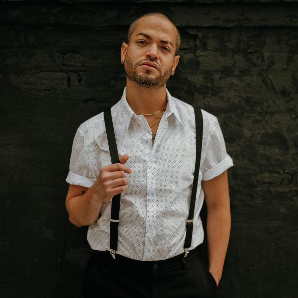 Groom in short sleeve spot shirt with braces