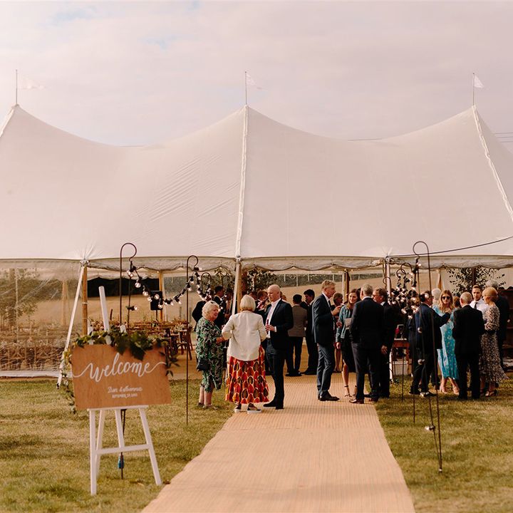Rustic wedding at White Pond Farm with wooden signs
