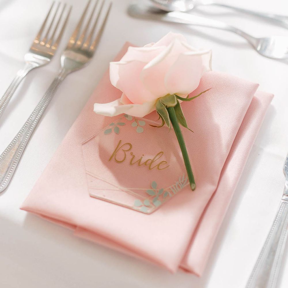 Blush pink napkin complete with gold name place and pastel pink floral