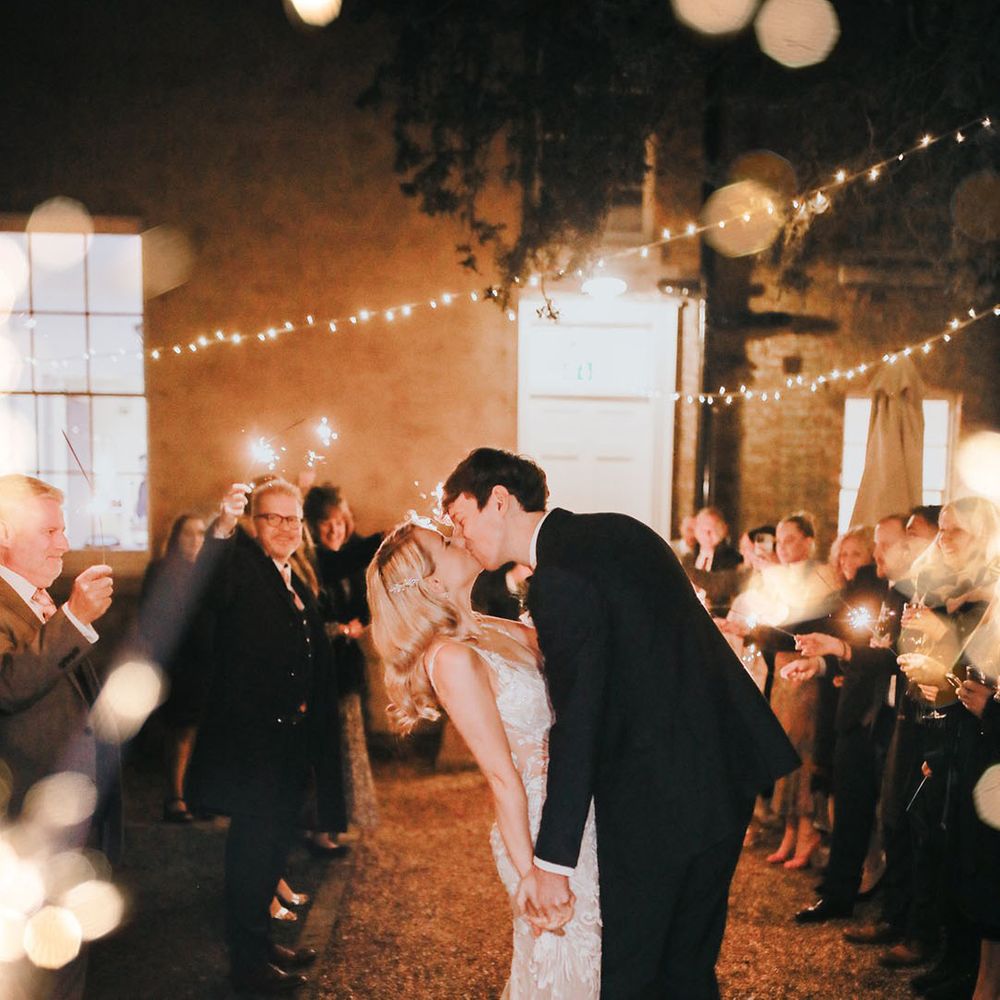 Sparkler send off at magical Christmas winter wedding 
