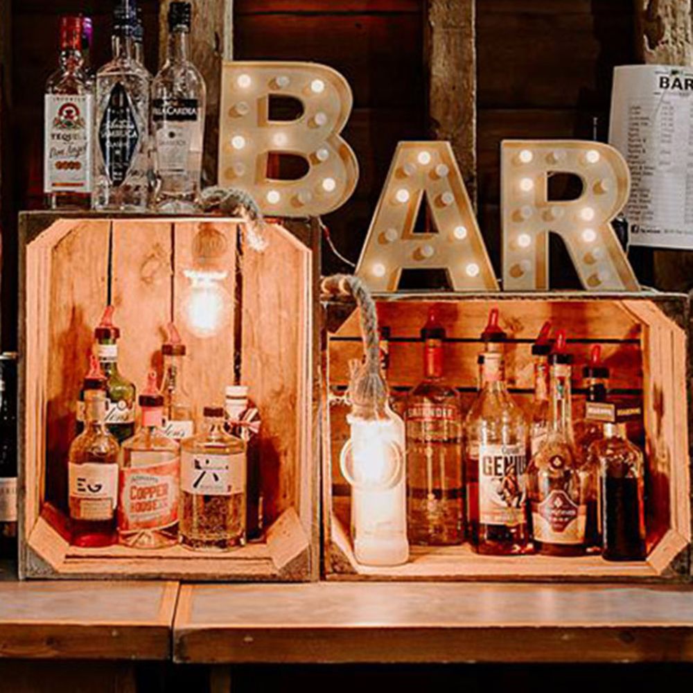 Rustic wedding bar design ideas with letter lights signage with wooden crates 